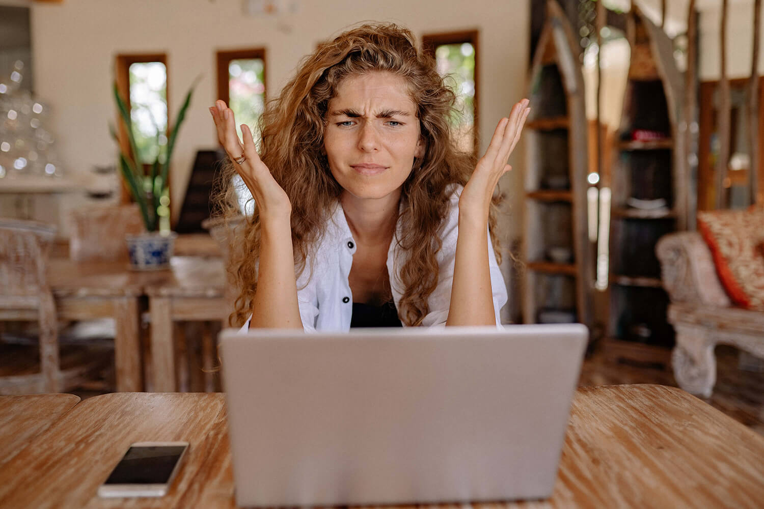 Confused woman using event rental inventory software