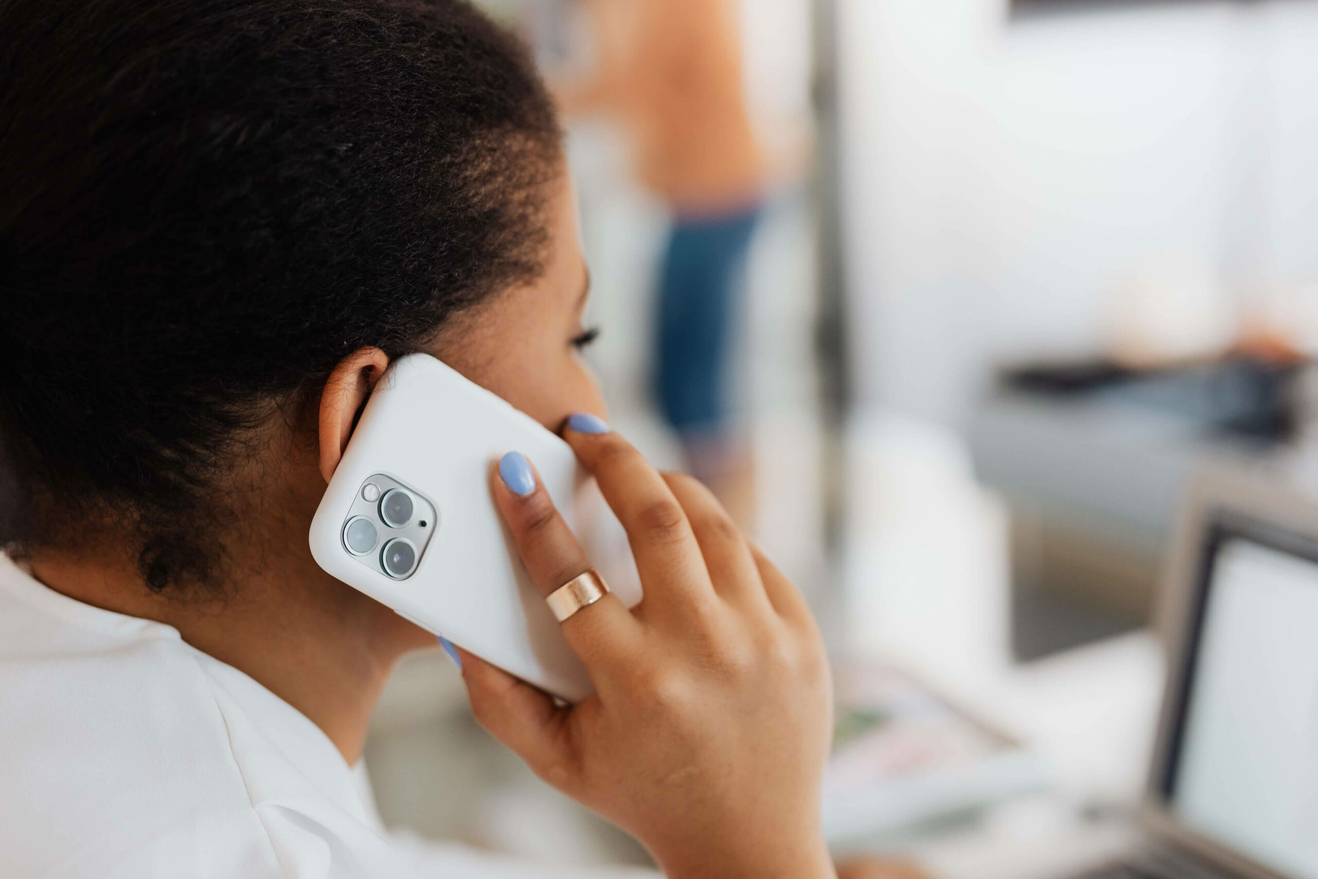 Woman on phone firing a customer