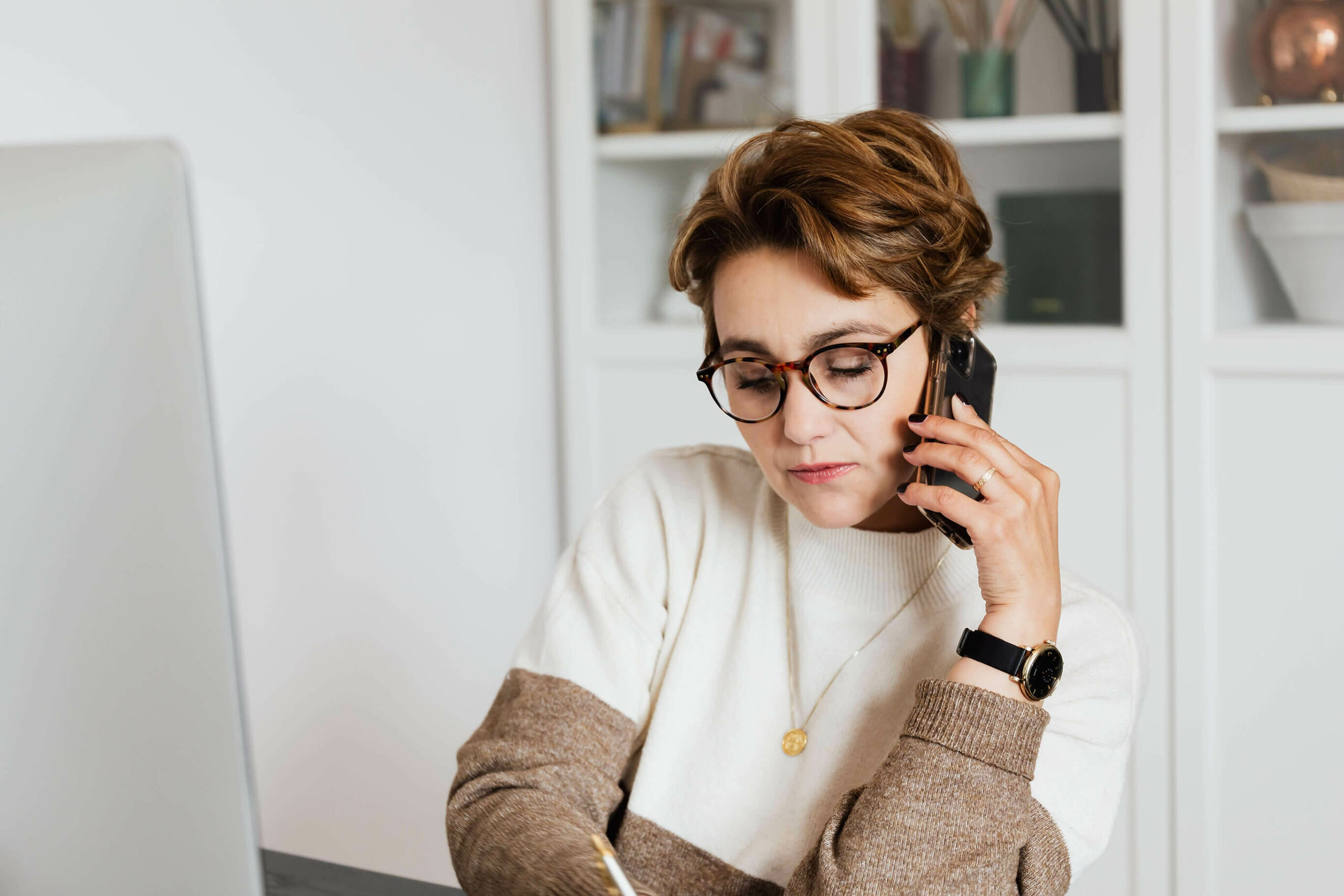 Woman talking on phone to event planner