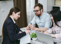 People negotiating contract for equipment rental
