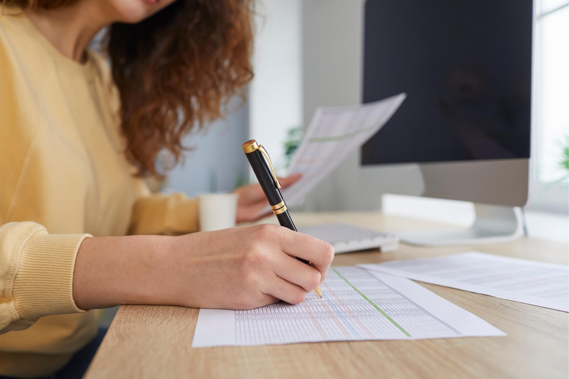 Woman pulling reports