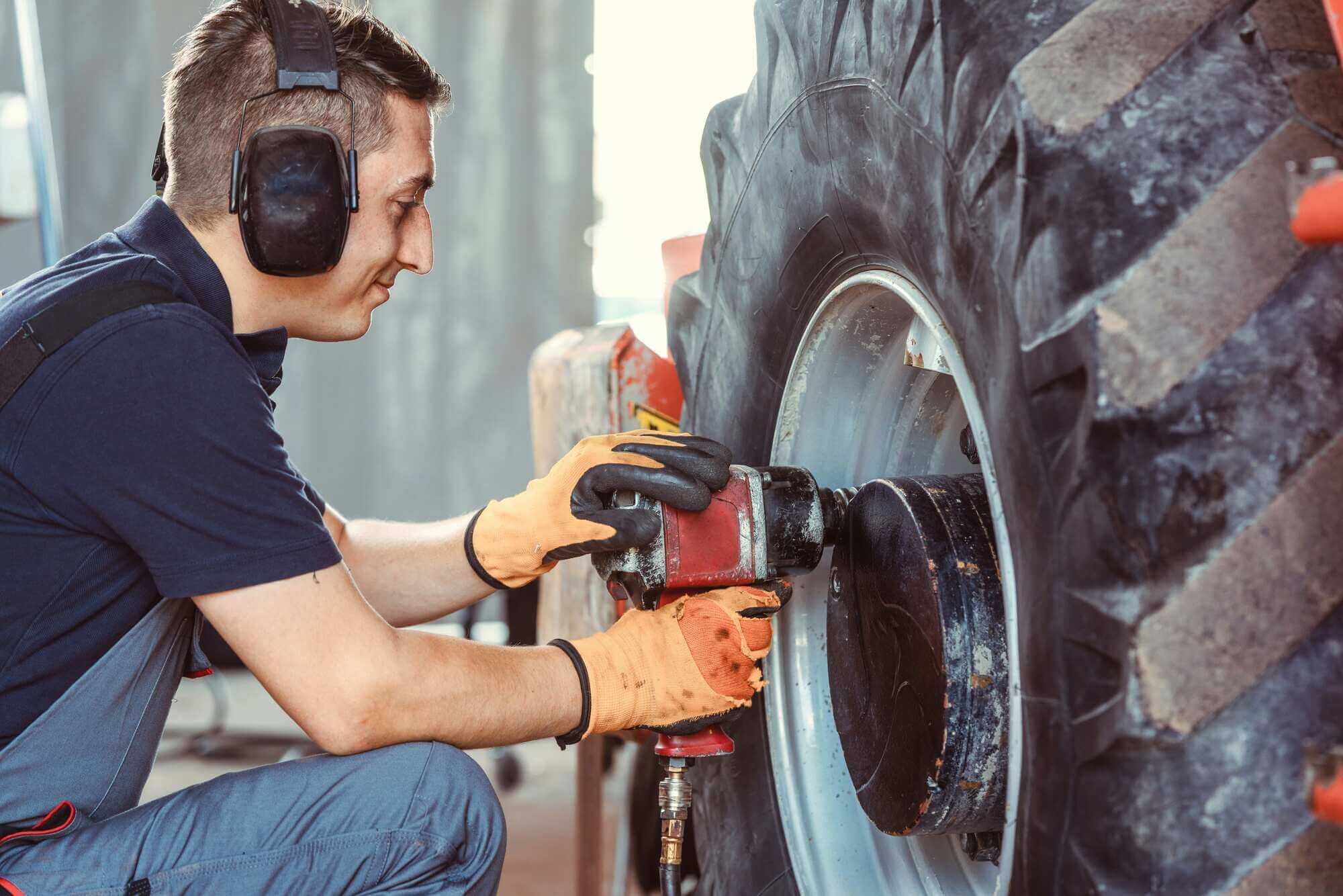 Worker Fixing Damaged Equipment