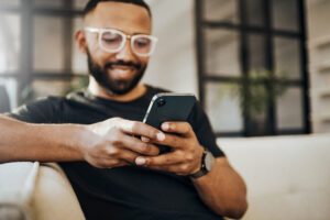 man shopping for rentals online