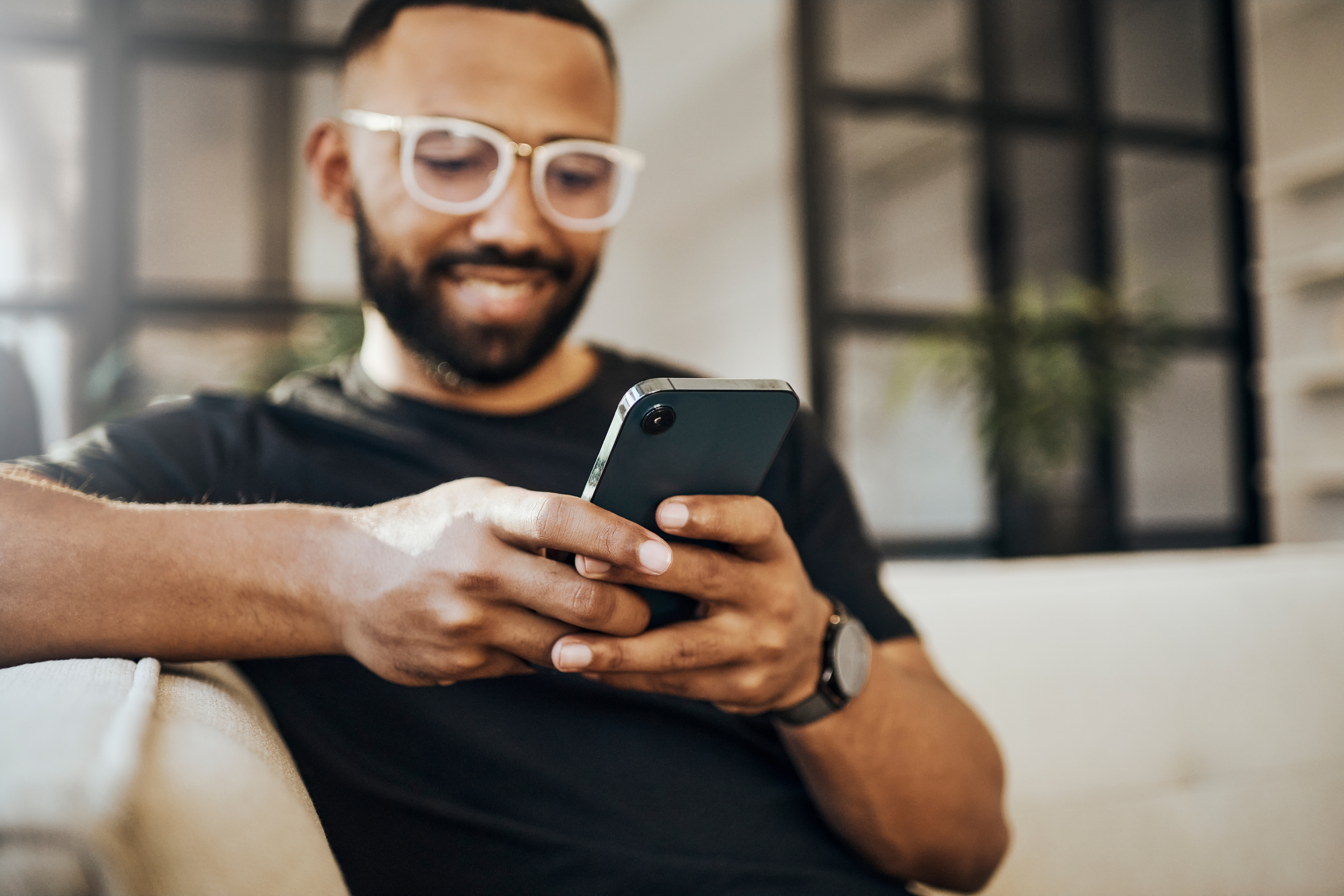 man shopping for rentals online